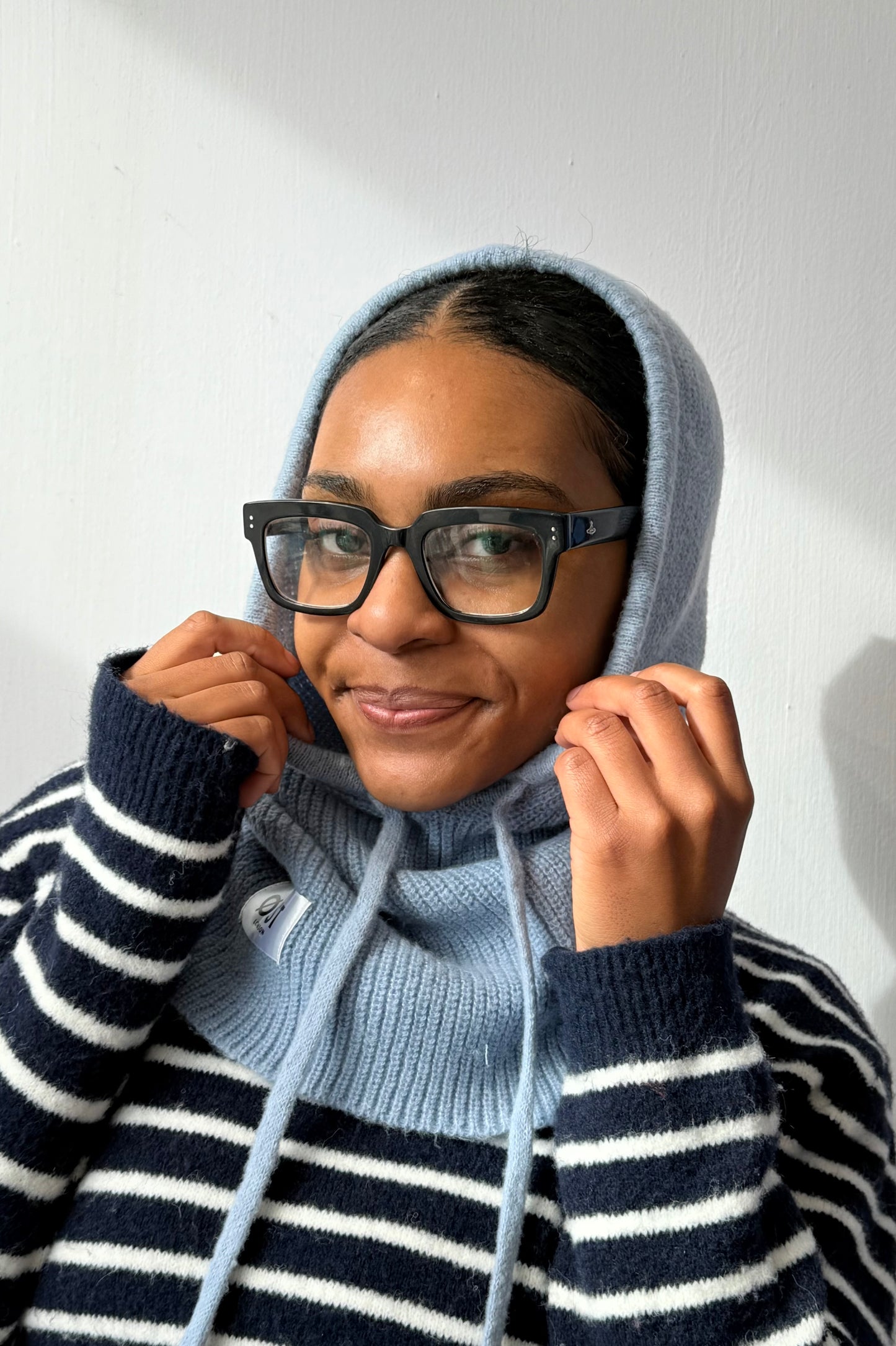 woman wearing a blue cashmere balaclava