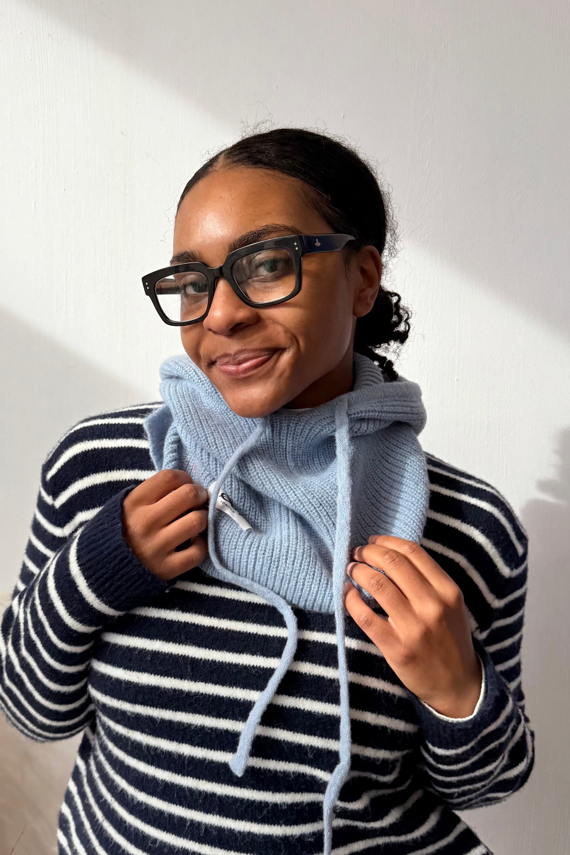woman wearing a blue cashmere balaclava
