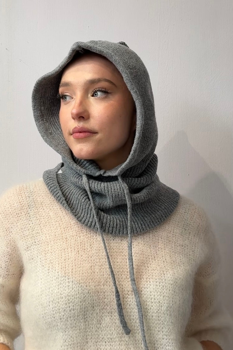 woman wearing a grey cashmere balaclava