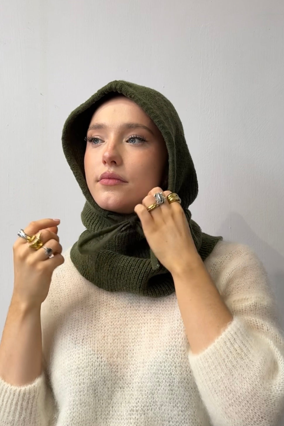 woman wearing a khaki cashmere balaclava