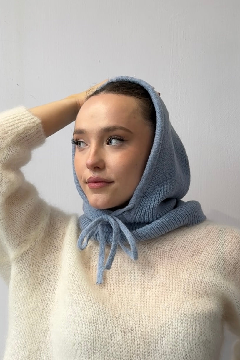 woman wearing a blue cashmere balaclava