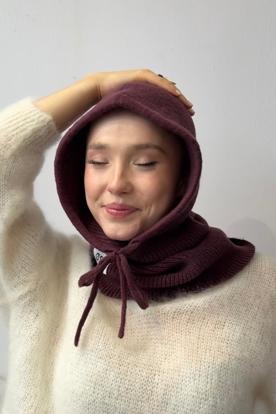 woman wearing a burgundy  cashmere balaclava