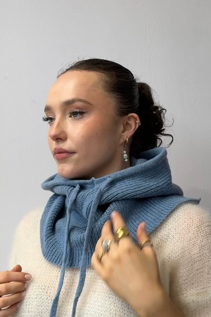 woman wearing a blue cashmere balaclava