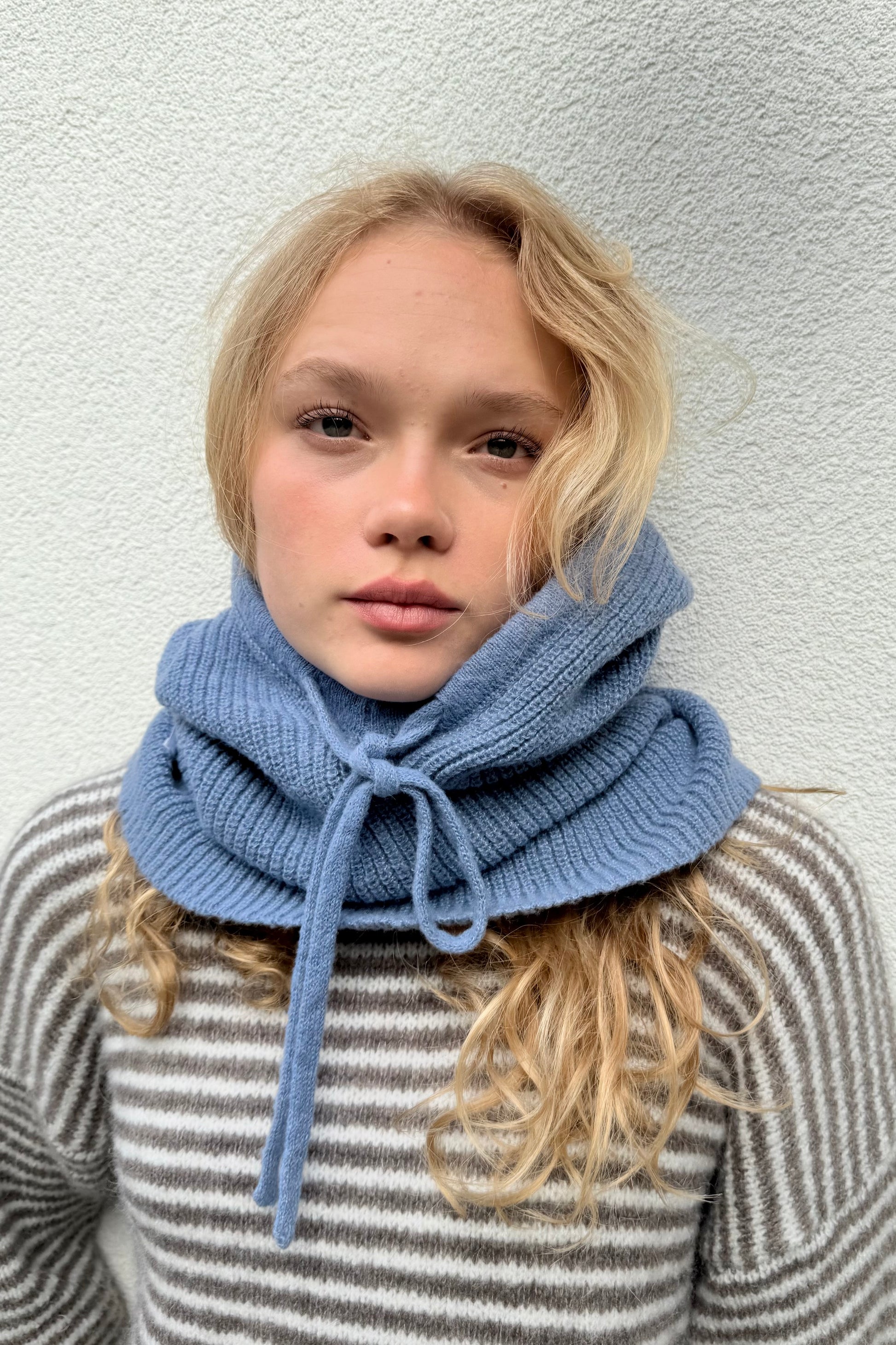 woman wearing a blue cashmere balaclava