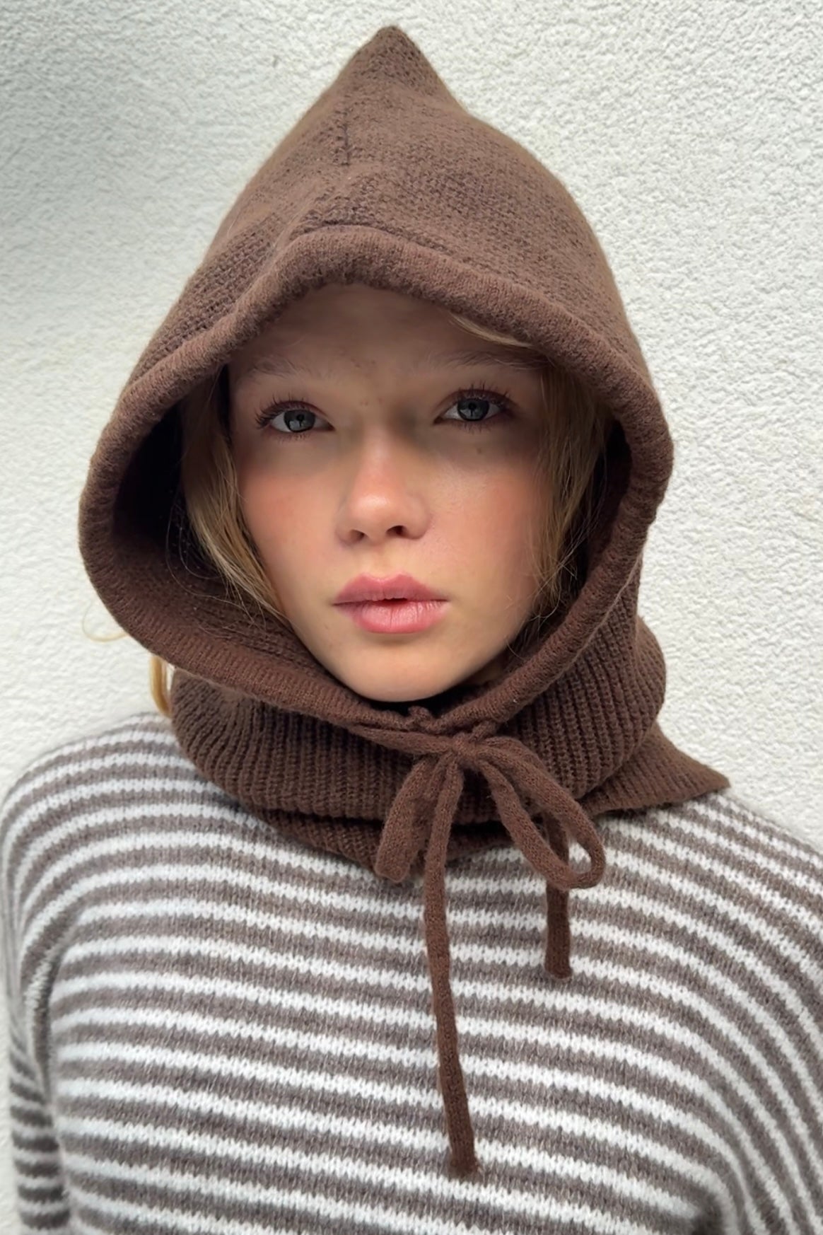 woman wearing a brown cashmere balaclava
